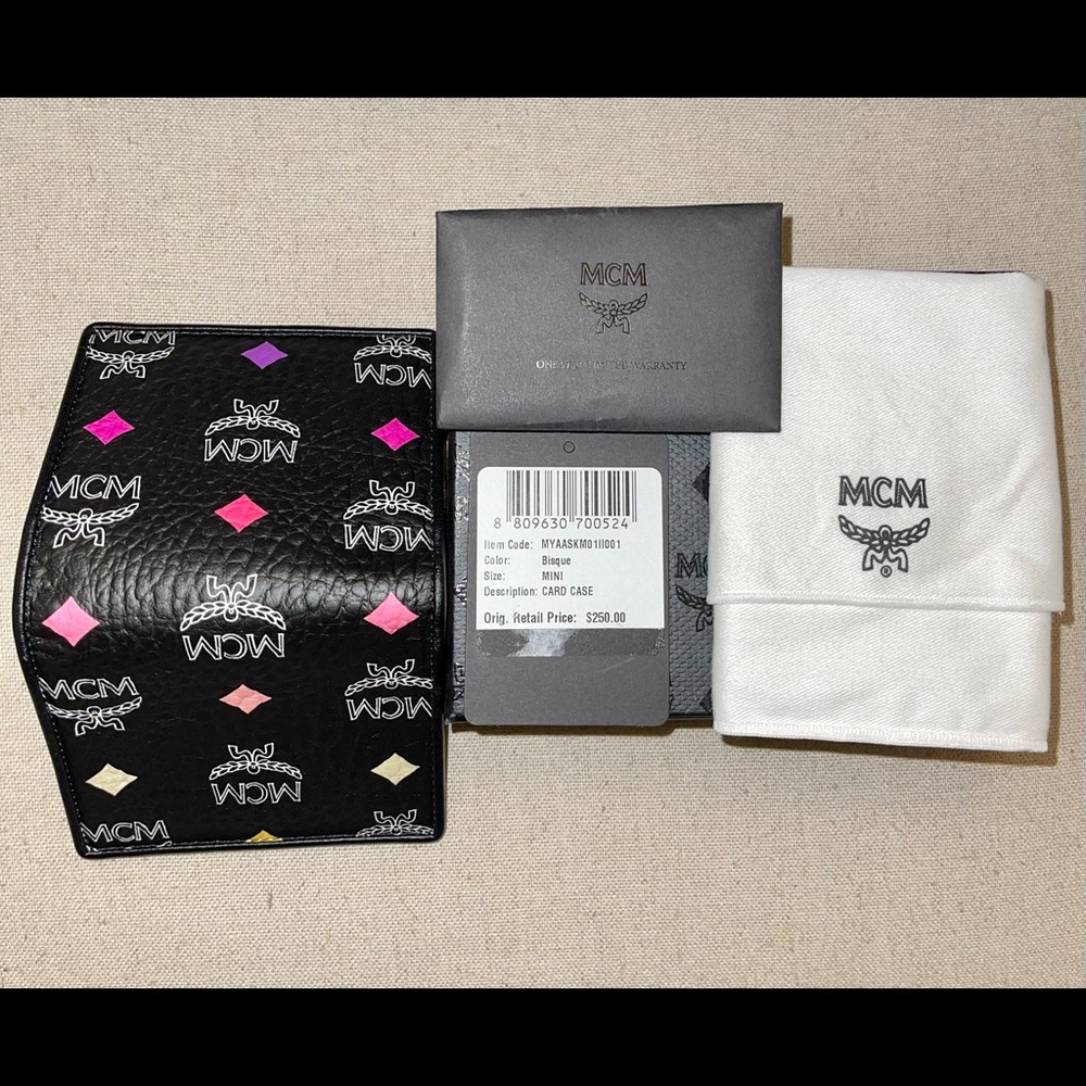 Authentic MCM Skyoptic Visetos Spectrum Diamond Bi-Fold Wallet. Price Firm